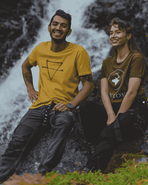 Adventure-couple-in-nature-smiling-in-front-of-water-fall-wearing-Rein-Love-Earth-tee-ochre-dye-and-khaki-Icon-tee